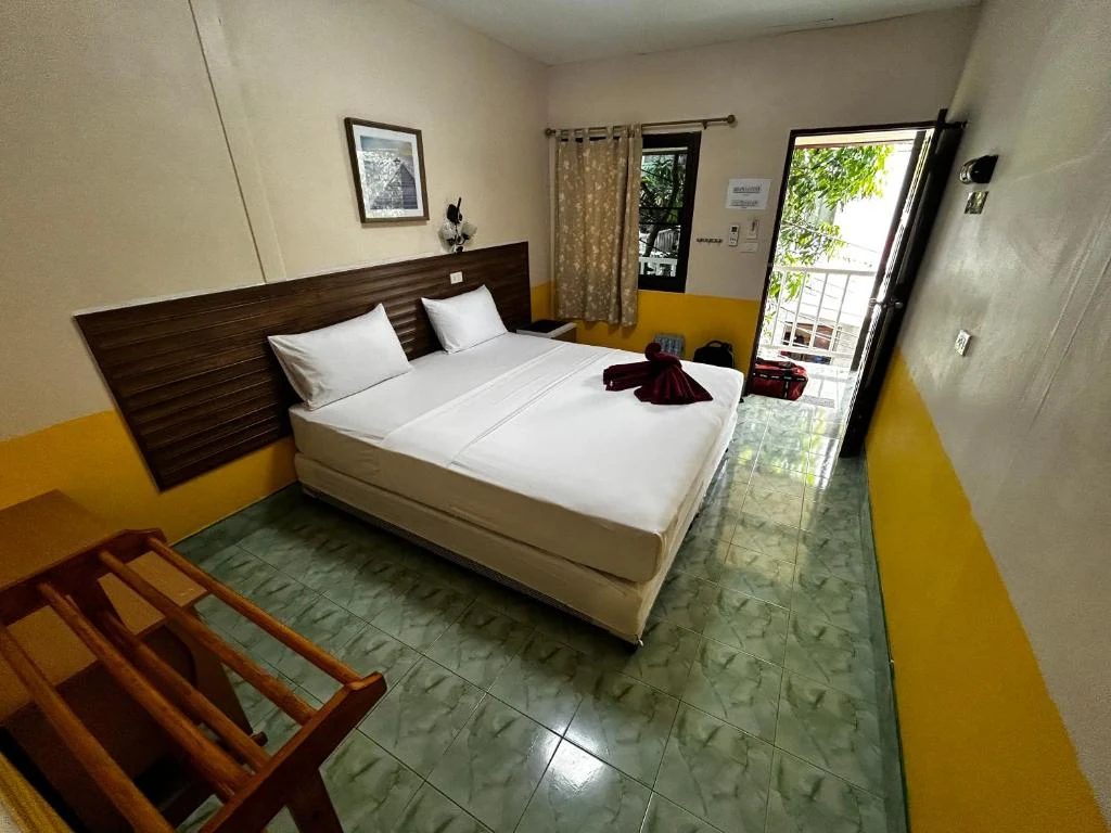 Coco's Guest House double room with private balcony access