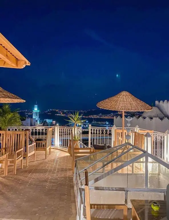 Kasba Blanca rooftop patio at night