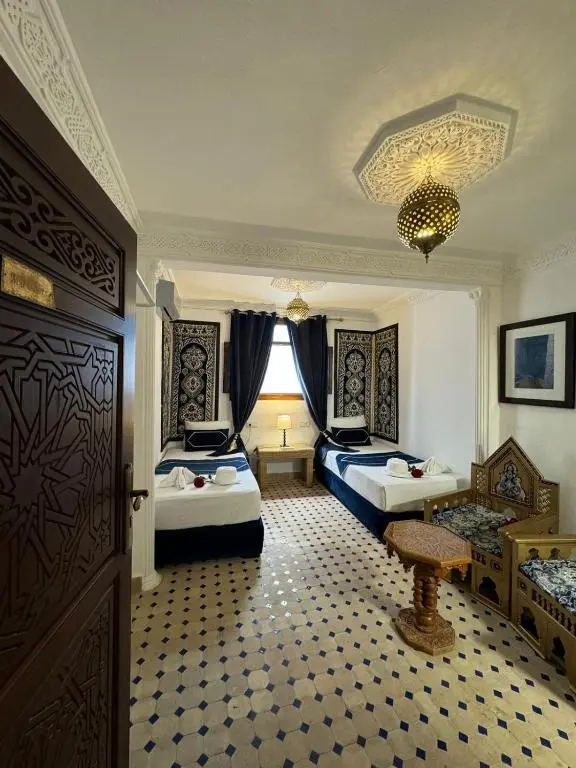 Colorful double room with traditional Moroccan décor at Kasba Blanca Tangier