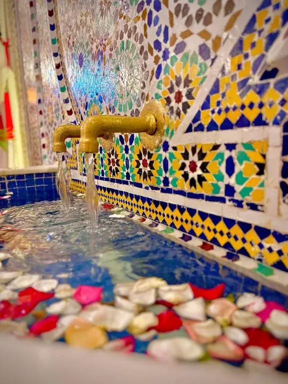 Colorful zellige fountain at Riad Al-Qurtubi Tangier