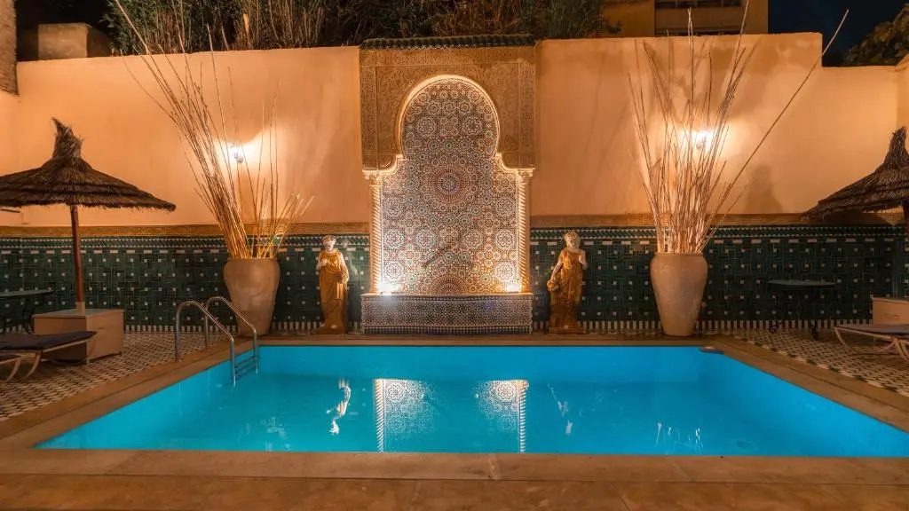 Pool and fountain inside Riad Fes Ziyat & Spa