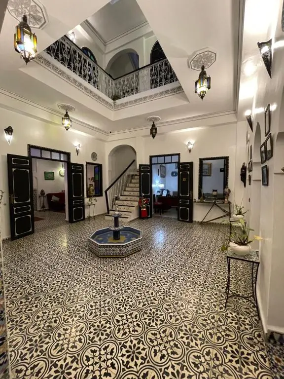 Central courtyard and mosaic fountain at Riad Tingis Tangier