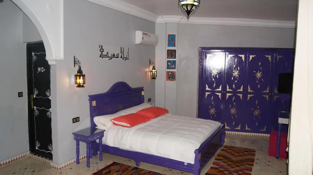 Purple double room with Moroccan décor at Riad Tingis Tangier