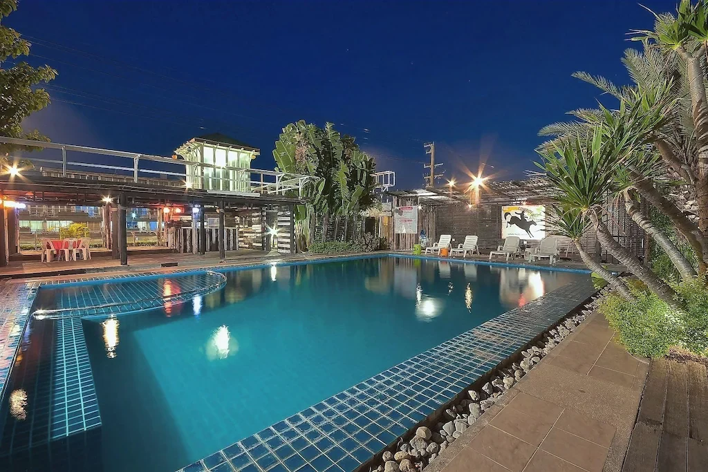 Swimming pool at night at Seasons Palace Resort Hua Hin