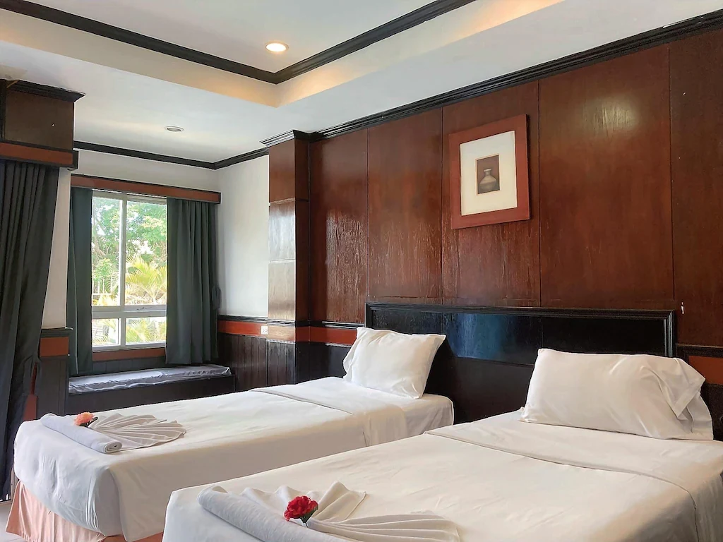 Twin room with garden view at Seasons Palace Resort Hua Hin