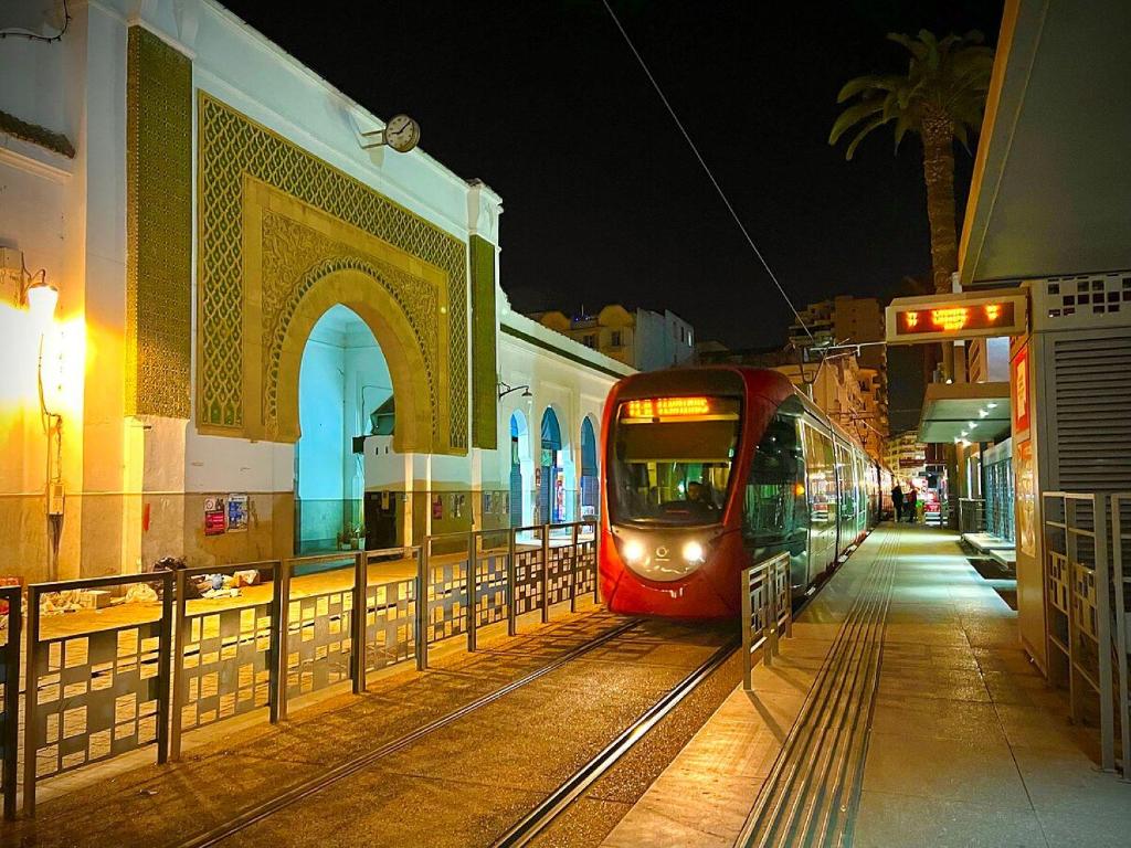Casablanca tram at night near The Hotel Syracuse