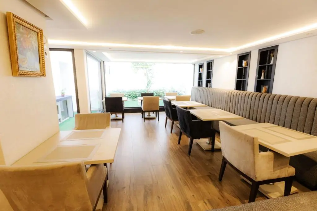 Modern dining room with large windows at Windsor Hotel City Center Casablanca