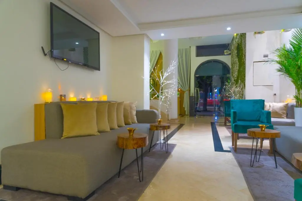 Modern lounge with yellow seating at Windsor Hotel City Center Casablanca