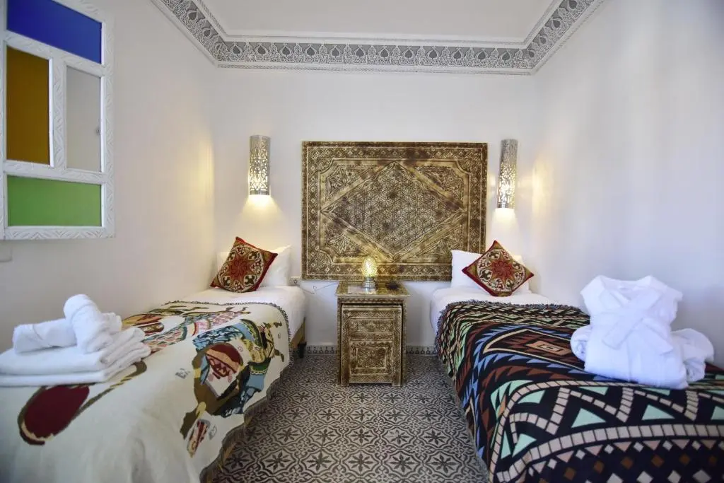 Twin room with traditional Moroccan decor at Zoco Riad